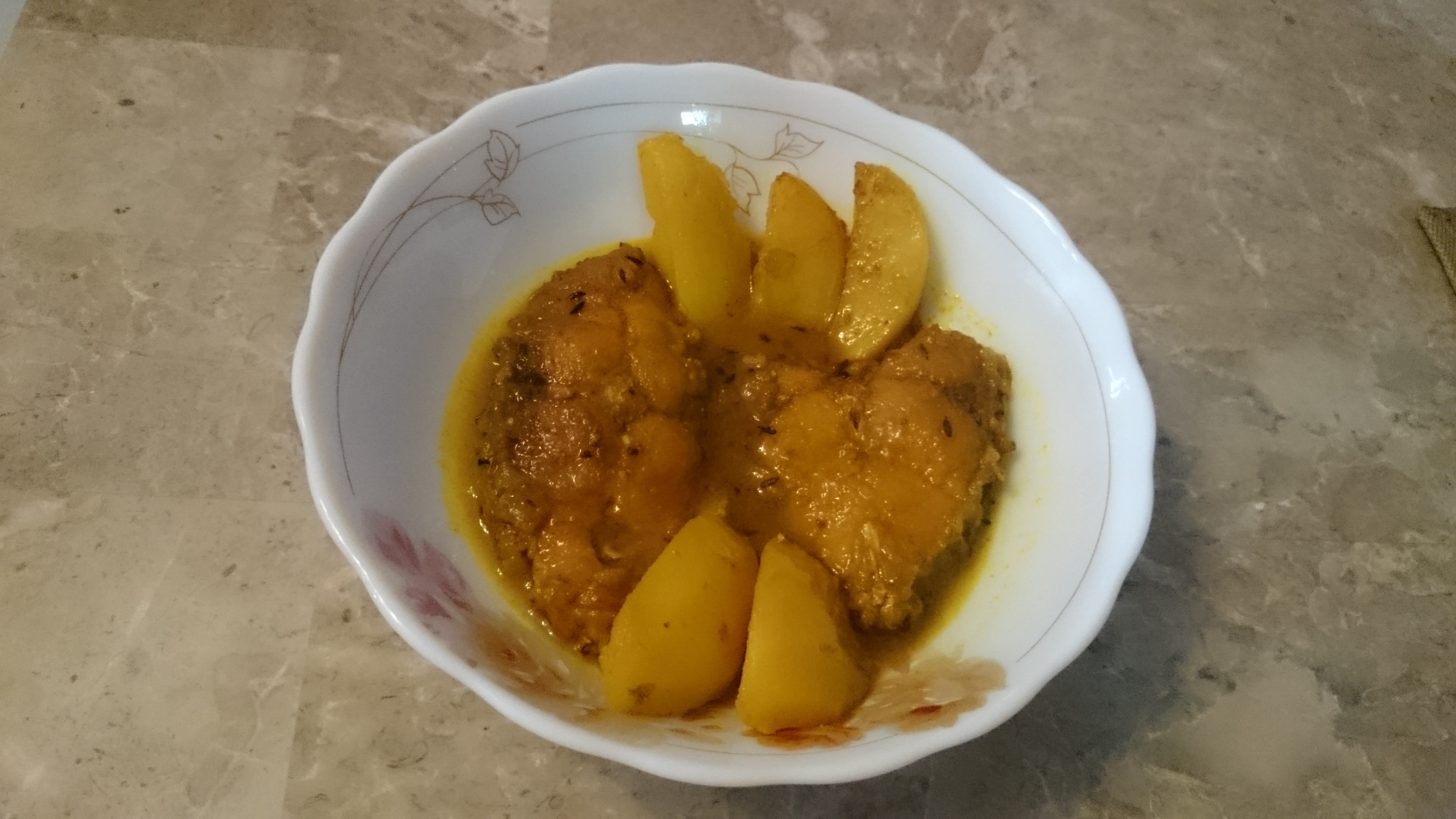Katla macher jhol (Fish stew)