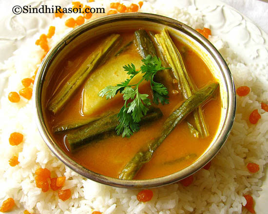 Sindhi Curry,Raita,Rice,Salad